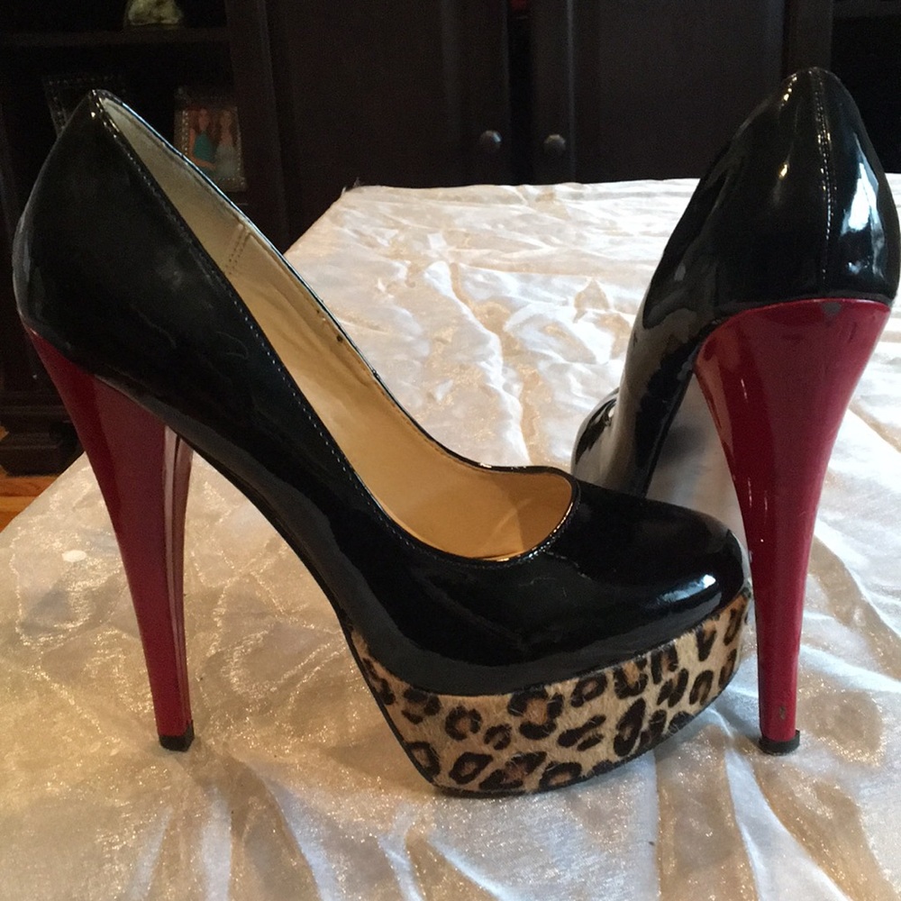 Steve Madden black pumps w/ red heel and cheetah